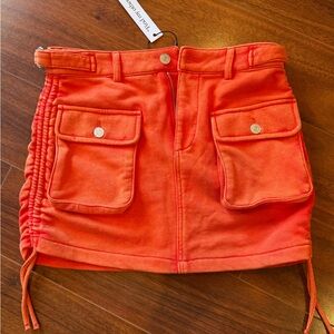 Bright orange utility cargo mini skirt